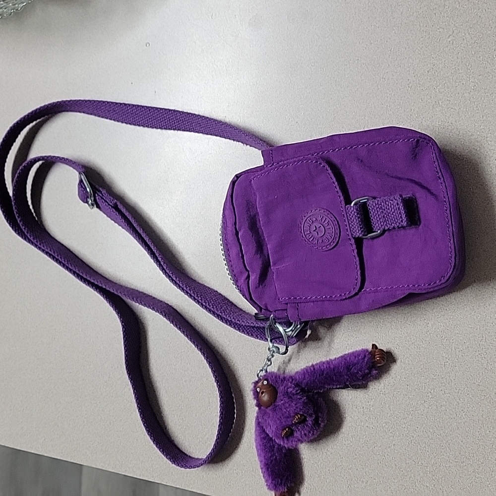 Kipling small crossbody. Purple. Used, clean. See pics for size.